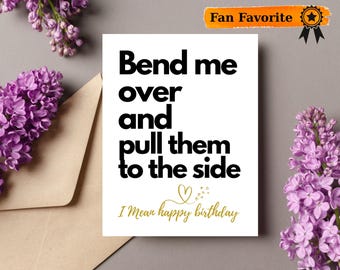 May include: A white card with black text that reads "Bend me over and pull them to the side I mean happy birthday". The card is decorated with a gold heart and stars.