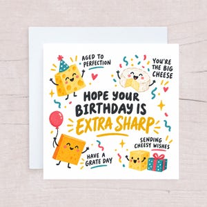 May include: A square greeting card featuring colorful cartoon cheese characters and confetti. The text reads: HOPE YOUR BIRTHDAY IS EXTRA SHARP, AGED TO PERFECTION, YOU'RE THE BIG CHEESE, SENDING CHEESY WISHES, and HAVE A GRATE DAY. The card is paired with a white envelope.