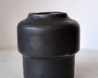 Modern rustic and minimalist ceramic flower vase in matte black. Soft form. Handmade. A beautiful decor for your home.