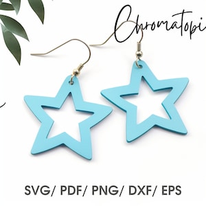May include: A pair of light blue star-shaped earrings with a cutout design. The earrings are on a white background.