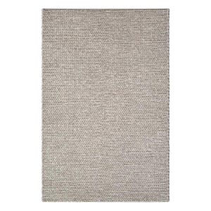 May include: A rectangular, neutral-toned rug with a woven texture. The rug's surface is a blend of light and dark gray fibers, creating a subtle, textured pattern. The rug is suitable for various interior design styles.