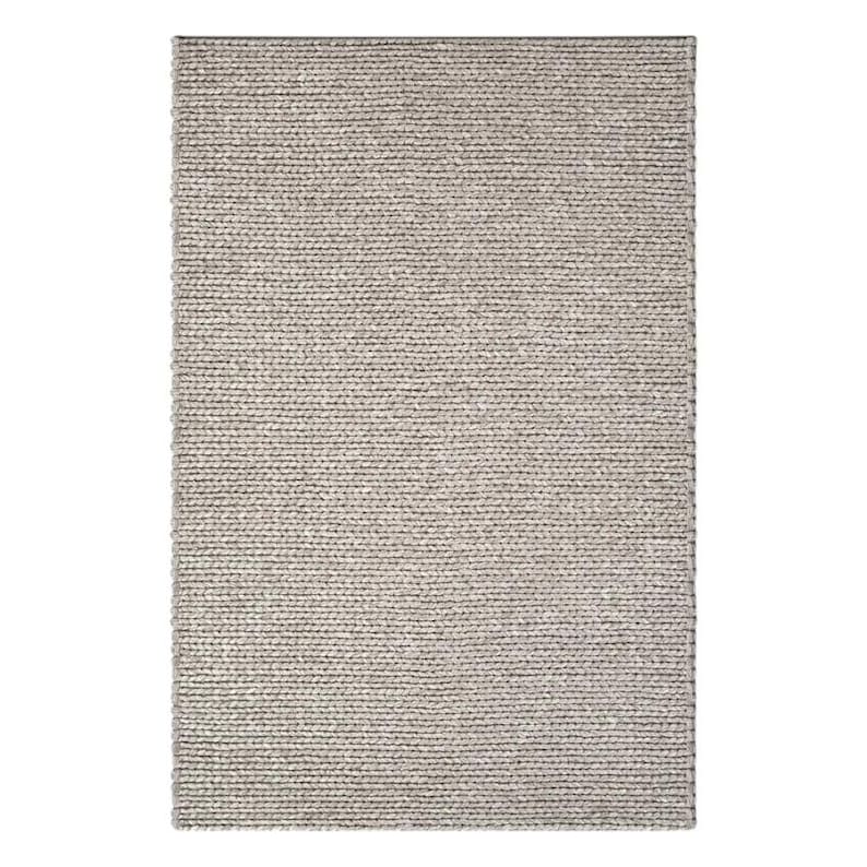 May include: A rectangular, neutral-toned rug with a woven texture. The rug's surface is a blend of light and dark gray fibers, creating a subtle, textured pattern. The rug is suitable for various interior design styles.
