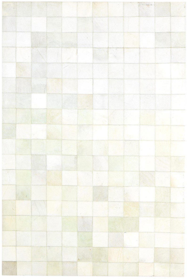 May include: A square, off-white rug with a patchwork design. The rug is composed of numerous small, square patches in varying shades of white, cream, and pale green, creating a subtle, textured pattern. The overall aesthetic is neutral and minimalist.