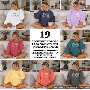 May include: A collection of nineteen Comfort Colors 1566 sweatshirts in various solid colors, each featuring the white text Paper Hanger Mockups printed on the chest. The image displays multiple color variations of the same long-sleeve crewneck.