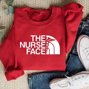 The Nurse Face, Retro Nurse Sweatshirt, Registered Nurse, Personalized Gifts, Gift For Nurse, Nurse Life, Nurse Graduation, Unisex Crewneck