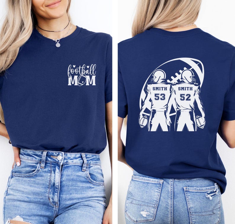 May include: Navy blue t-shirt with white graphic text "football MOM" on the front. The back features a football design with two football players, the name "SMITH" and the numbers "53" and "52".