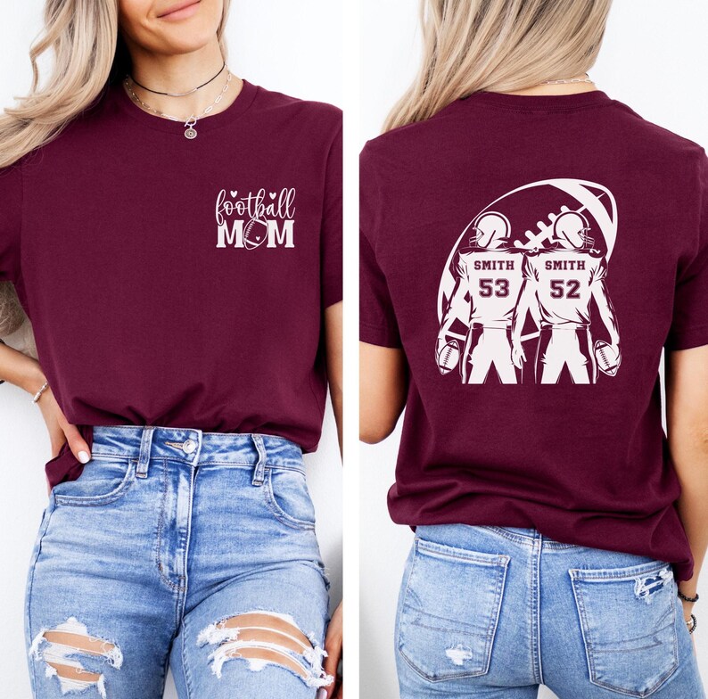 May include: Burgundy t-shirt with the text "football MOM" and a football graphic. The back of the shirt features a football design with two football players, the name "Smith", and the numbers 53 and 52.