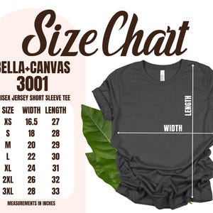 May include: A dark gray unisex short sleeve t-shirt with a size chart. The chart lists measurements in inches for sizes XS to 3XL. The text "Size Chart" is at the top, with "Bella + Canvas 3001" and "Unisex Jersey Short Sleeve Tee" below.