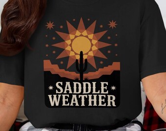Saddle Weather T-Shirt, Retro Western Graphic Tee, Vintage Style Sun and Cactus Design, Outdoor Adventure Shirt, Comfortable Casual Wear