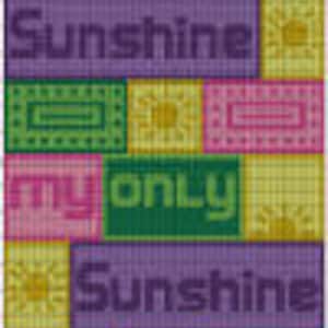 May include: A colourful cross-stitch pattern with the text "You are my sunshine, my only sunshine". The pattern features a variety of colours, including yellow, green, pink, purple, and blue. The text is in a bold, blocky font.