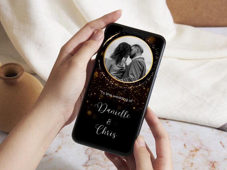 May include: A black and gold digital wedding invitation with a photo of a couple kissing. The text reads "To the wedding of Danielle & Chris".