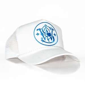 May include: White trucker hat with a blue embroidered logo of a stylized "S&W" in a circle.