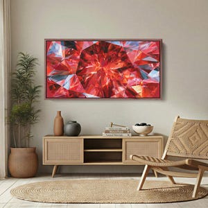 May include: A rectangular wall art piece featuring a vibrant, high-contrast abstract print of a faceted red gemstone with sharp geometric angles, deep crimson hues, and bright white light reflections, framed in a thin, dark wooden border.