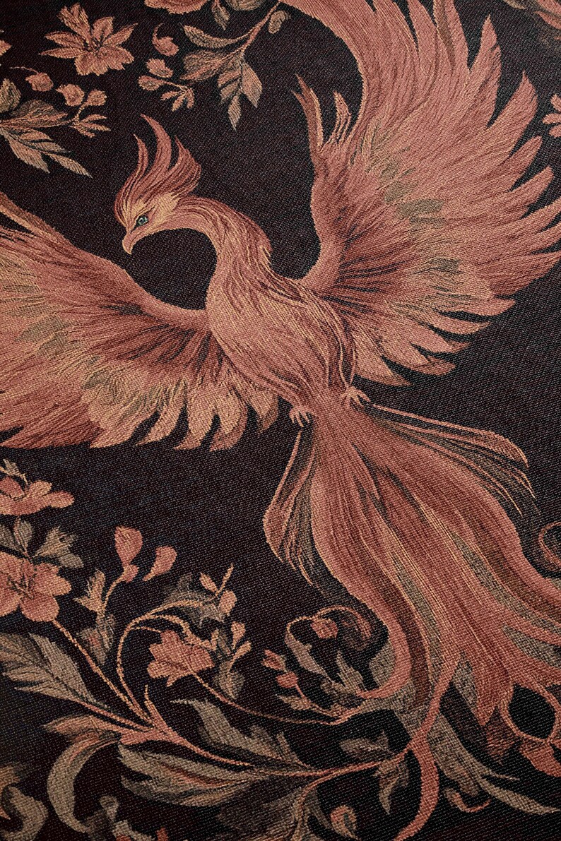 May include: A tapestry featuring a pink phoenix with intricate details, set against a dark background with floral patterns.