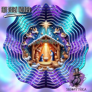 May include: A purple and blue metal wind spinner with a Christmas nativity scene design. The scene features a stable with a star above it, a manger with baby Jesus, Mary, Joseph, and animals. The text "FREE DESIGN INCLUDED!" is at the top of the image.