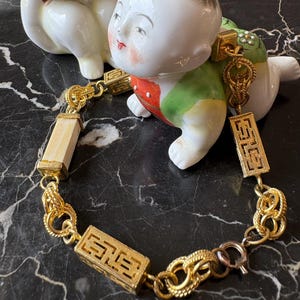 Vintage Chinese Motif Gold Tone and Ivory Color Rectangular Links Bracelet