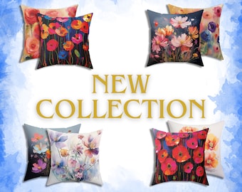 May include: Six decorative throw pillows with floral patterns. The pillows feature a variety of flowers, including poppies, cosmos, and other wildflowers. The pillows are arranged in a grid pattern on a blue watercolor background. The text "NEW COLLECTION" is displayed in gold letters below the pillows.