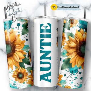May include: A white tumbler with a teal "AUNTIE" design. The tumbler is surrounded by a pattern of sunflowers, green leaves, and blue paint splatters on a white background.