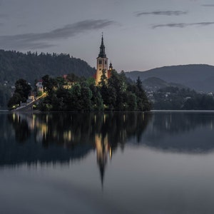 Lake Bled Slovenia, Bled Lake, The Assumption of Mary Church in after sunset in the dark, water reflection, with night  illumination