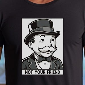 The Banker is Not Your Friend T Shirt | Parody Tee | Anti-Billionaire Humor | Greed | Funny Eat the Rich | Wealth Inequality TShirt