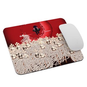 May include: A red and white mousepad with a black and white illustration of a character standing on a crescent moon. The background is filled with white and red Japanese characters.