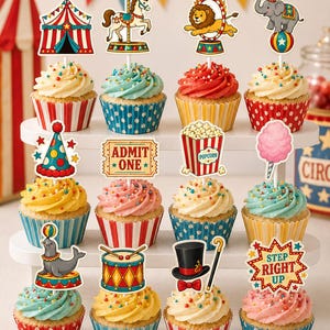 May include: A set of twelve cupcakes arranged on a tiered stand, each topped with a circus-themed paper topper. The toppers feature illustrations of a tent, carousel horse, lion, elephant, party hat, ticket, popcorn, cotton candy, seal, drum, top hat, and sign.