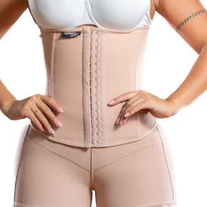 May include: A beige body shaper with a lace trim and a hook and eye closure. The shaper has a high waist and covers the thighs.