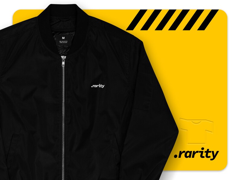 May include: Black bomber jacket with a zipper closure and a white embroidered logo that says ".rarity" on the left chest.
