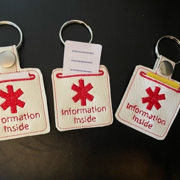 Medical alert key rings with information pocket