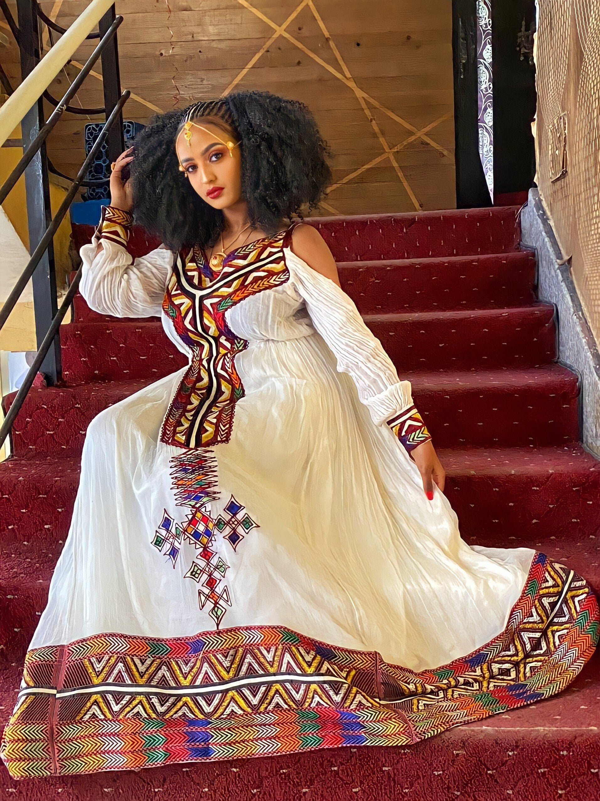 Exquisite Ethiopian Eritrean Habesha Kemis Vibrant Wide Dress With Intricate Red Yellow And 