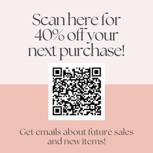 May include: A promotional graphic with a light pink background. The text "Scan here for 40% off your next purchase!" is displayed above a QR code. Below the QR code, the text reads "Get emails about future sales and new items!"