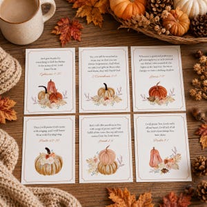 May include: Six rectangular cards featuring watercolor pumpkin illustrations and Bible verses. Each card displays text including Ephesians 5:20, 2 Corinthians 9:11, James 1:17, Psalm 69:30, Jonah 2:9, and Psalm 9:1, surrounded by autumn-themed floral accents.