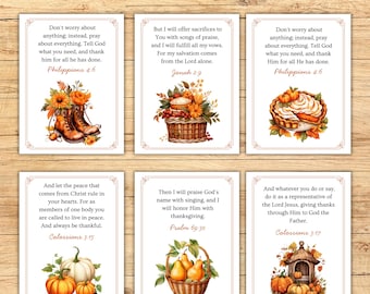 May include: Six rectangular cards titled Fall Scripture Cards, each featuring a unique Bible verse and autumn-themed illustrations including boots, baskets, pumpkins, and pies. The cards have decorative borders and are arranged in two rows of three.