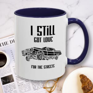 Lowrider Coffee Mug with Famous Lyric – Chicano Style Car Cup – Cadillac Hopping Art – Urban Street Culture Gift – 11oz 15oz Ceramic Mug