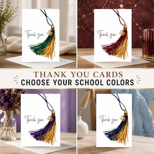 May include: White thank you cards with a graduation tassel design in various school colors. The cards feature the words "Thank you" in elegant script. The text "THANK YOU CARDS CHOOSE YOUR SCHOOL COLORS" is also displayed.