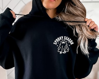 May include: Black hooded sweatshirt with a white ghost graphic and the text "Spooky Season".