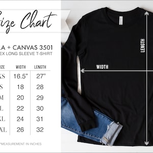 May include: Black unisex long sleeve t-shirt with a size chart. The chart shows measurements in inches for sizes XS to 2XL. The shirt's width ranges from 41.9 cm to 66 cm, and the length from 68.6 cm to 81.3 cm.