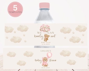 May include: Water bottle label with a pink and brown teddy bear holding balloons. The label says "We bearly can wait" and "Baby Ellie 12.31.2025". The bottom of the label says "Leilani's Baby Shower 05.01.2025".