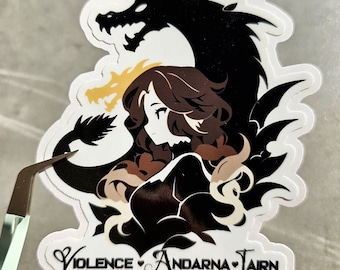May include: A sticker featuring a black and white illustration of a woman with long brown hair and a dragon. The woman is wearing a crown and the dragon is curled around her. The text "VIOLENCE ANDARNA TAIRN" is at the bottom of the sticker.