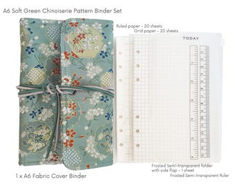 May include: A soft green A6 fabric cover binder set with a Chinoiserie pattern. The set includes ruled and grid paper, a semi-transparent folder with a side flap, and a ruler. The binder is tied with a green and gray cord.