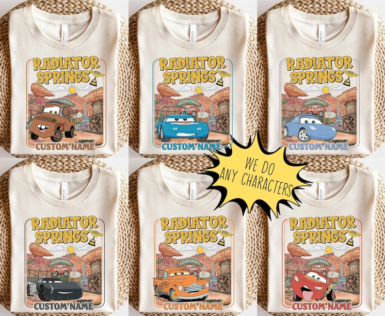 May include: Cream-colored t-shirts featuring the "Radiator Springs" design with various cartoon car characters. Each shirt has a different car graphic and the text "CUSTOM NAME". A yellow starburst graphic says "WE DO ANY CHARACTERS".