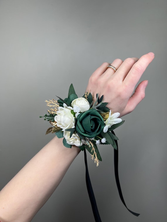 what corsage goes with a green dress I  working with greenespecially emerald green for this corsage. Did you  see all the beautiful green dresses on the Oscars red carpet? Gorgeous!  Definitely a trend for prom 2026 too! Happy