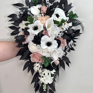 flowers for black bridesmaid dresses Black bridesmaid dresses with blue flowers