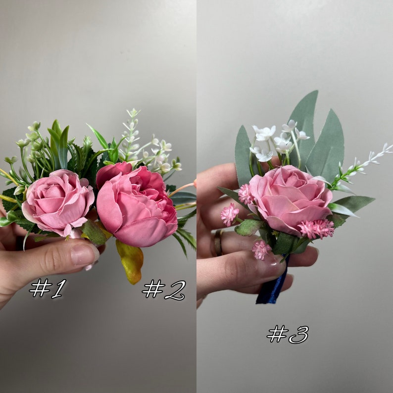 May include: Three pink flower boutonnieres with greenery and white flowers. The boutonnieres are labeled #1, #2, and #3.