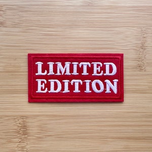 May include: Red fabric patch with white embroidered text that reads "LIMITED EDITION".