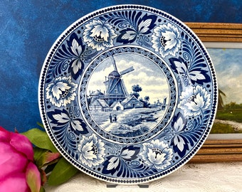 Belle plaque murale bleue vintage de Delft, avec moulin et paysage hollandais emblématique, polder avec moulin, jeux d'eau, ciel nuageux hollandais