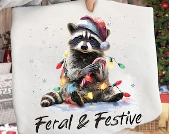 Feral and Festive Raccoon PNG, Funny Christmas Raccoon Clipart, Cute Holiday Sublimation Design, Funny Christmas PNG, Digital Download