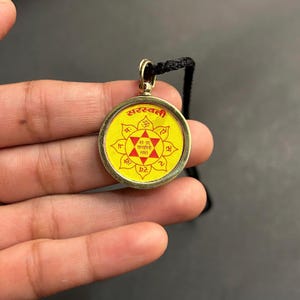 Saraswati Yantra Pendant Photo & Mantra Kavach Ashtadhatu Saraswati Pendant Yantra Locket for Students Saraswati Pendant Wisdom Kavach
