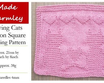 May include: A pink knitted square featuring a textured pattern of two cats and a central heart, with a border of smaller hearts along the top. The text reads Made Warmley Loving Cats Cotton Square Knitting Pattern, 8 inches by 8 inches, 38g, 4mm.