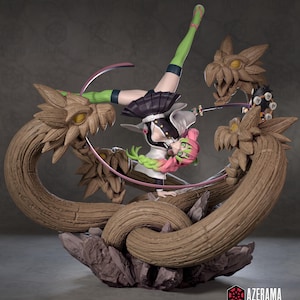 May include: A dynamic figurine of a character from the anime series, Demon Slayer. The figure is posed mid-action, with a sword and surrounded by stylized wooden dragon-like structures. The character has pink and green hair, wearing a black and white outfit. The base is a rocky, textured surface.